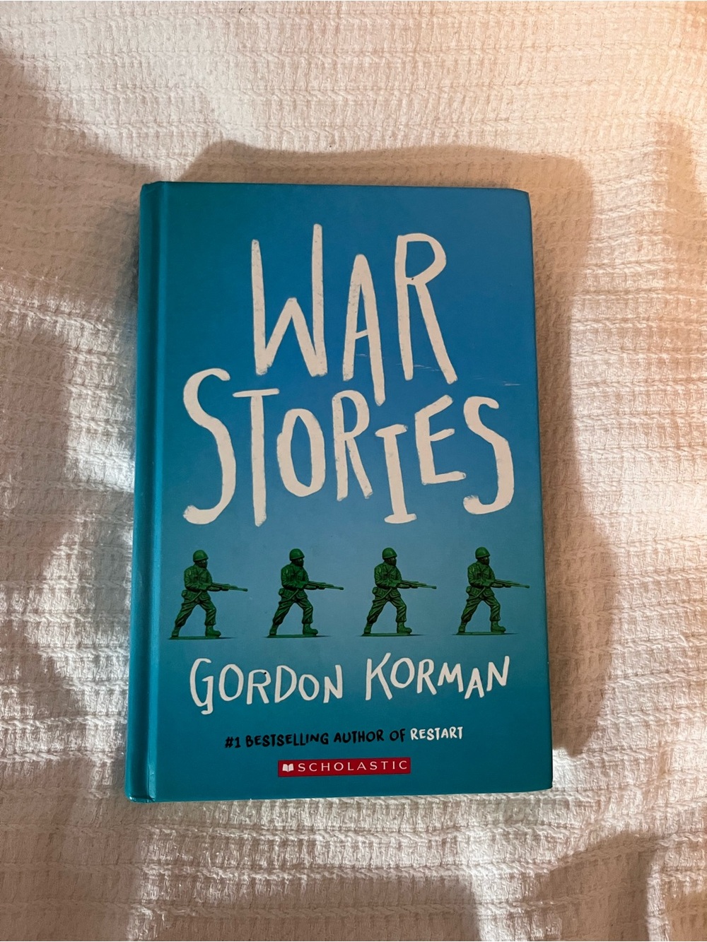 Scholastic Blue "War Stories" by Gordon Korman